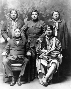 Group of Osage Men. Pictured L-R: Back: Ed Cox #165, Joe Mills #419, George Pitts #761Seated: Gilbert Cox #139, Charlie Wahreshe #40