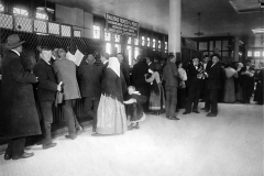 immigrants buying railroad tickets