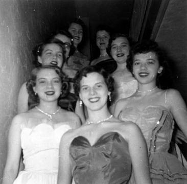 Hillcrest nursing students pose in their formals before and event, 950s