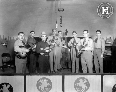 Bob Wills and the Texas Playboys at the Cains Academy of Dancing (now know as the Cains Ballroom) preparing for the noon show on KVOO radio.
