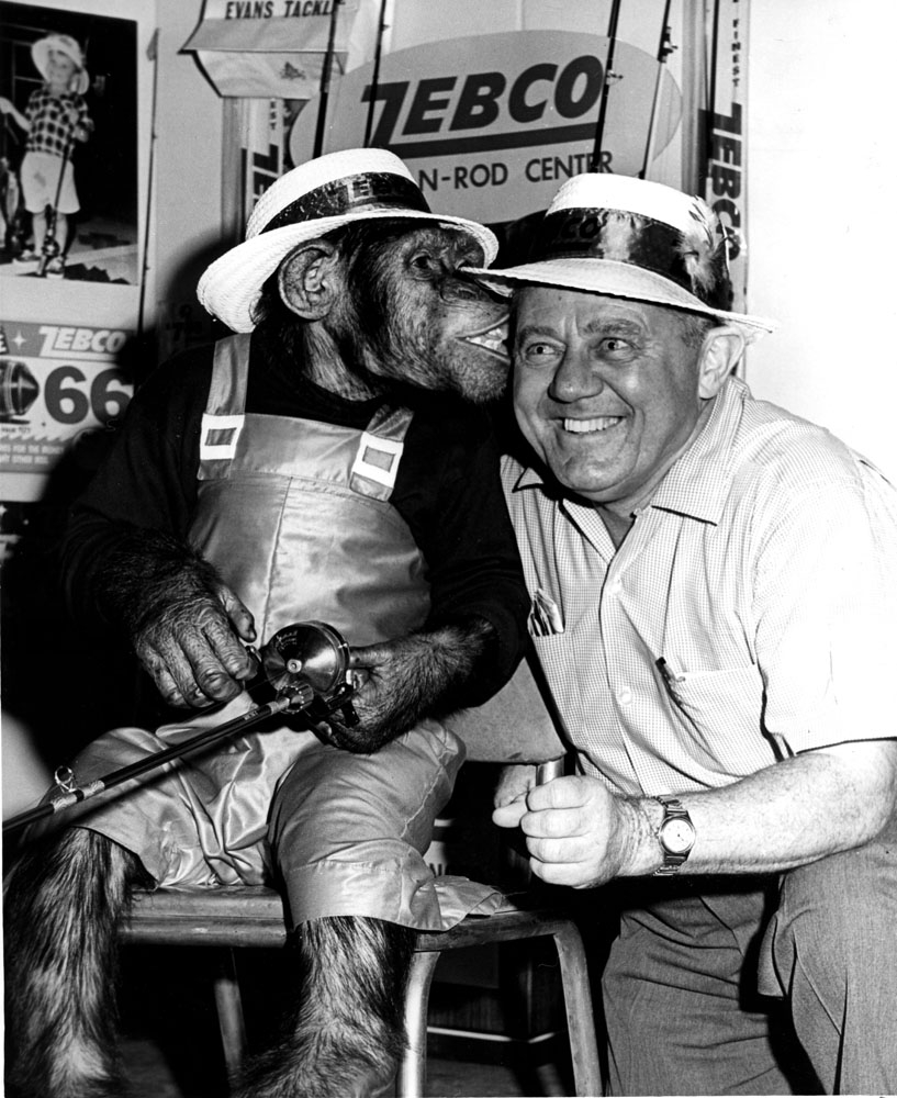 Zebco's fishing Chimpanzee with sales representative Bill Carter.